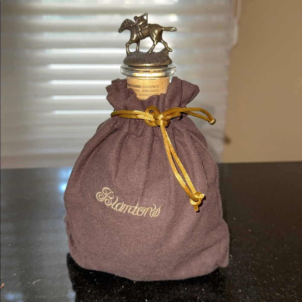 Blanton’s empty Whiskey Bottle horse / jockey cork with letter O and Brown Bag